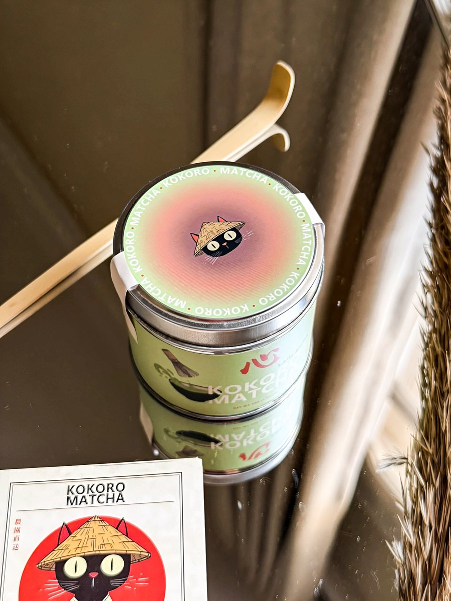 The Kokoro Matcha can from above, showing the green and pink lid with Kokoro's face